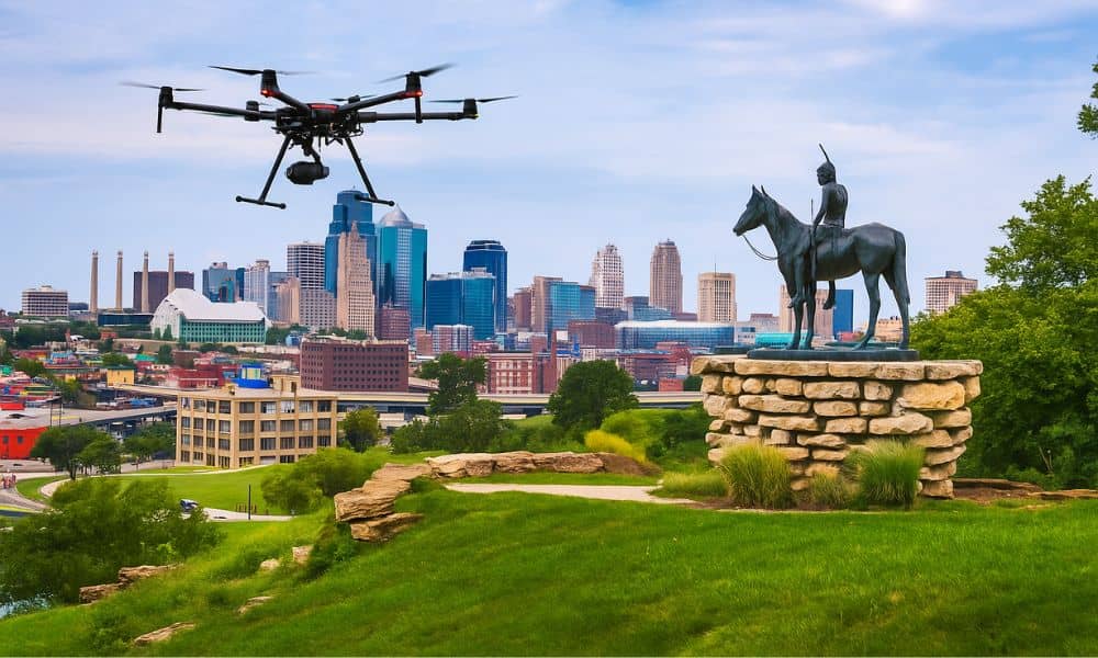 kansas city drone lidar mapping - ALTA SURVEY Missouri A drone hovers near the Scout statue overlooking downtown Kansas City, symbolizing the use of aerial LiDAR mapping in modern urban development.